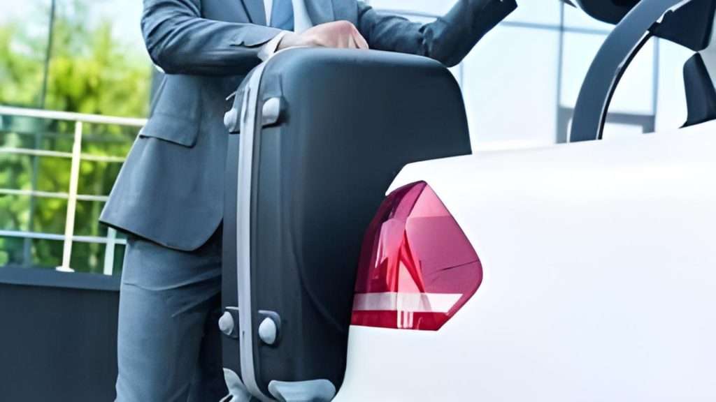 Chauffeur assisting with bags at Gold Coast Airport.