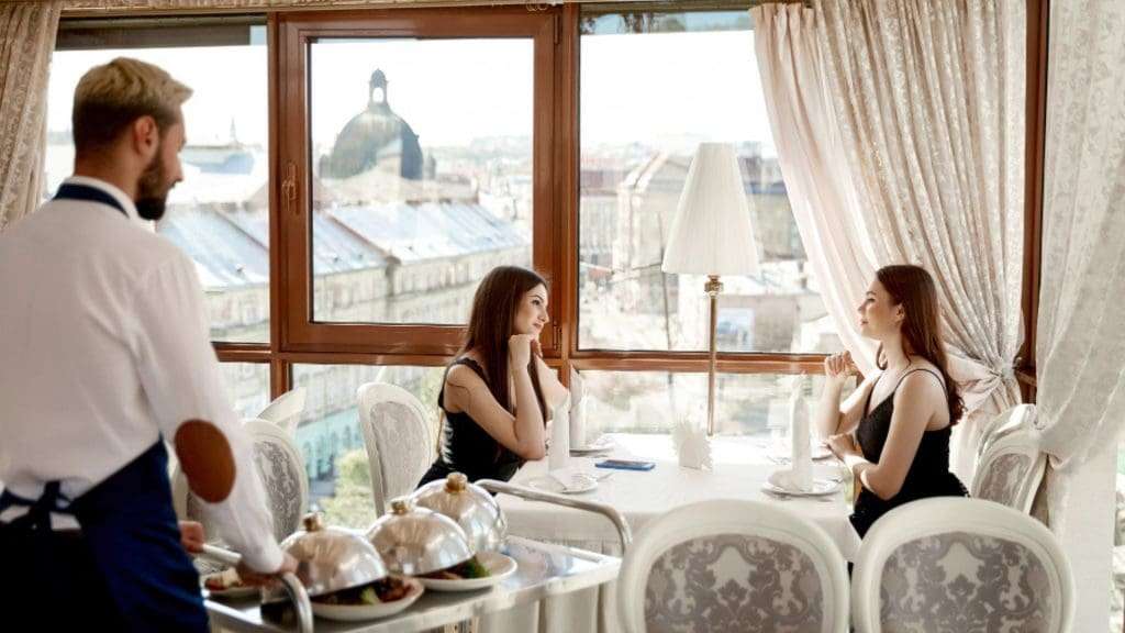 Sydney Hotels Two women enjoying luxury dining.