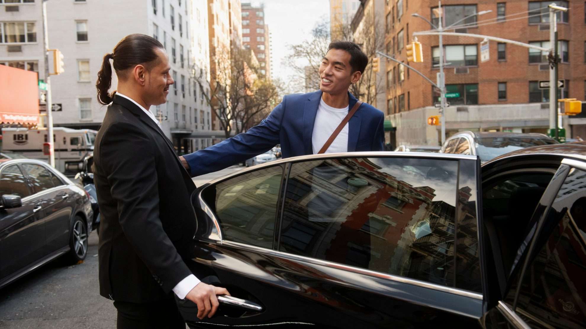 Gold Coast Limousine Services chauffeur greeting client