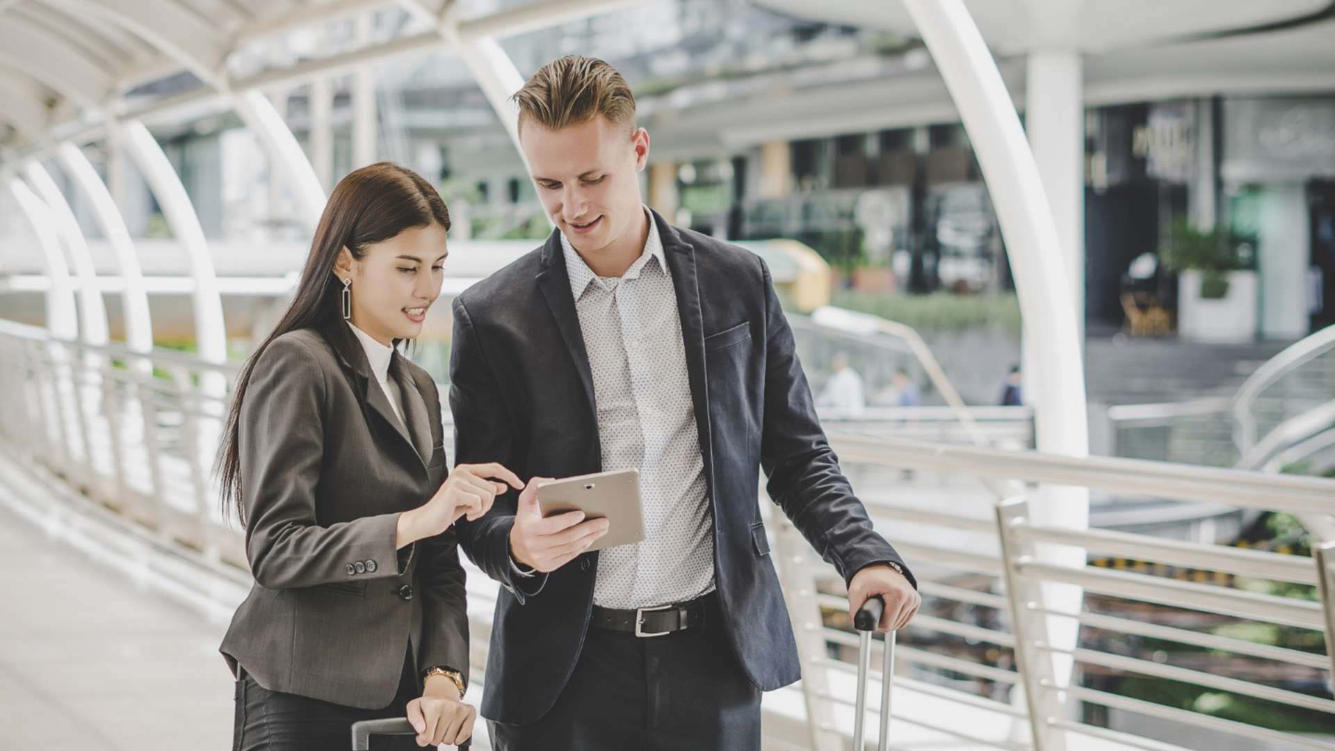 Business executive entering luxury car for corporate transfer Gold Coast